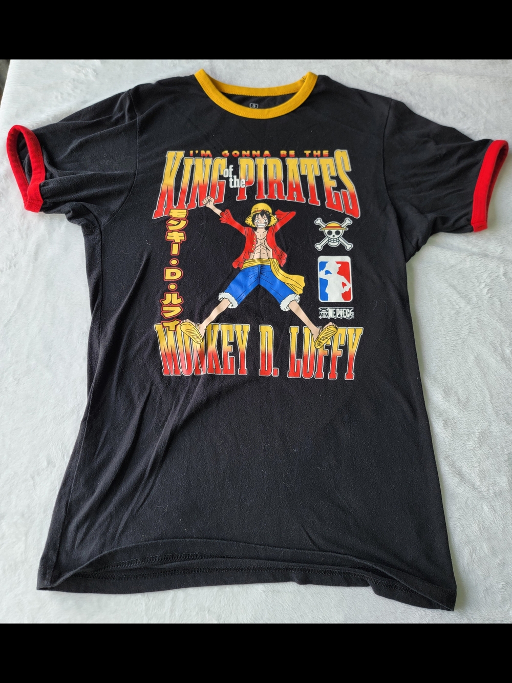 Onepiece Black Graphic Ringer Tee with Red & Yellow Accents